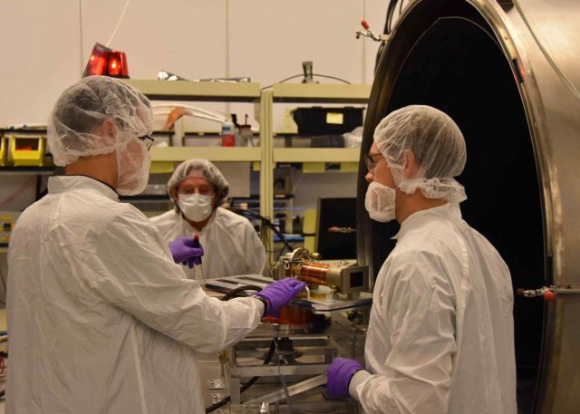 Members of the Mars 2020 Perseverance rover Mastcam-Z hardware development group work out the details for thermal vacuum testing of the Engineering Qualification Model camera at ASU in November, 2018.