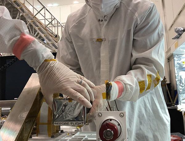 JPL technician Seth Harvey installs the right Mastcam-Z camera head during the June, 2019 integration of the Perseverance rover’s remote sensing mast (RSM).